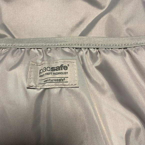 Pacsafe Dark Blue Backpack with Bright Blue Accents - Picture 7 of 13